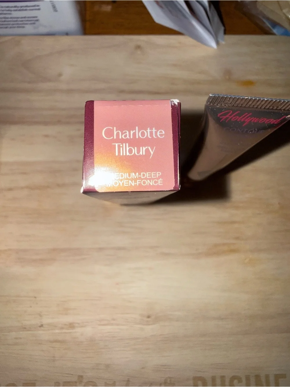 Charlotte Tilbury Contour Tube in medium-deep with Gradient Plum-Pink Box